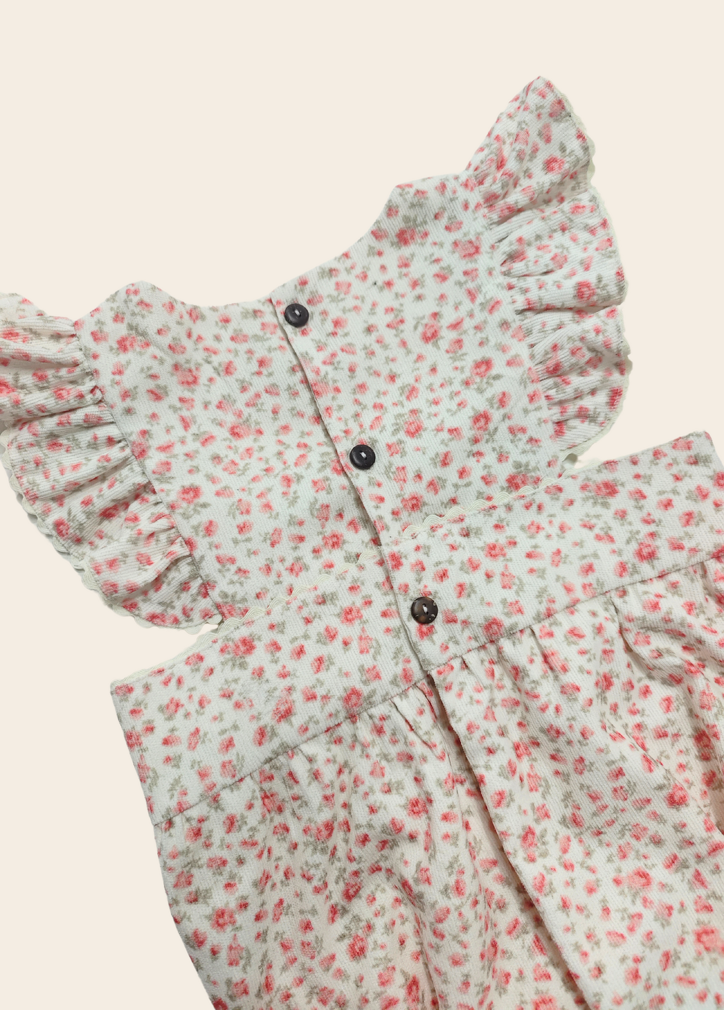 MAMELUCO GINEBRA COTELE FLORES ROSADAS
