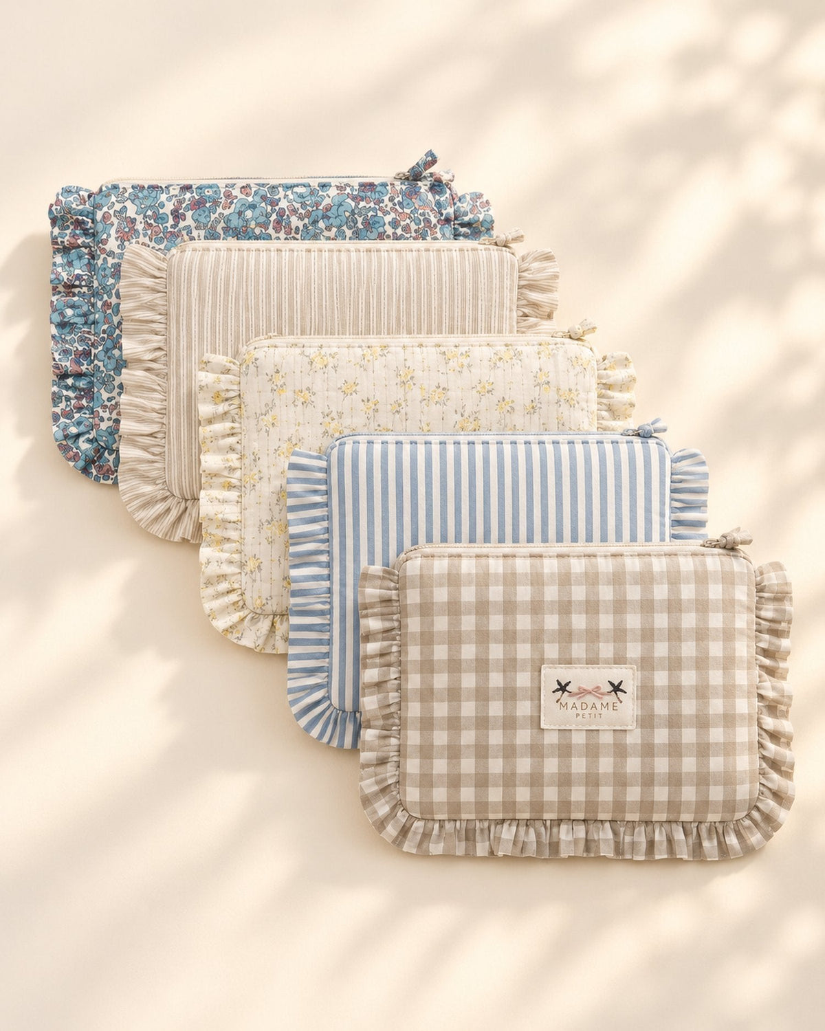 Pañaleras acolchadas con vuelos Madame Petit en distintos estampados